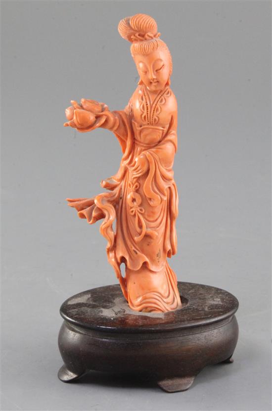 A Chinese carved coral figure of a lady, mid 20th century, total height 17.5cm